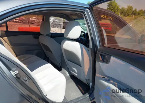 2009 Kia Optima Lx z USA, uszkodzony, nr VIN KNAGE228X95293983